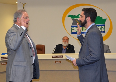 PHOTO: New board member Curtis Pierce (left) is sworn in by Bryce Autin (right), GLPC Legal Counsel. Also pictured: Commissioner Perry Gisclair (center), Board President
